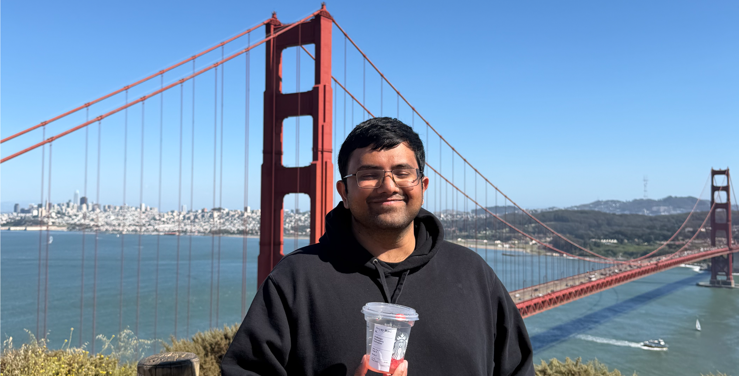 Avyay standing in front of the Golden Gate Bridge